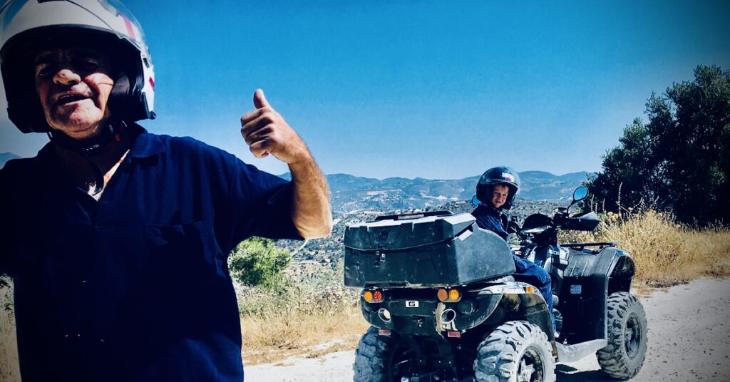 Andreas and Fletcher on the quad bike